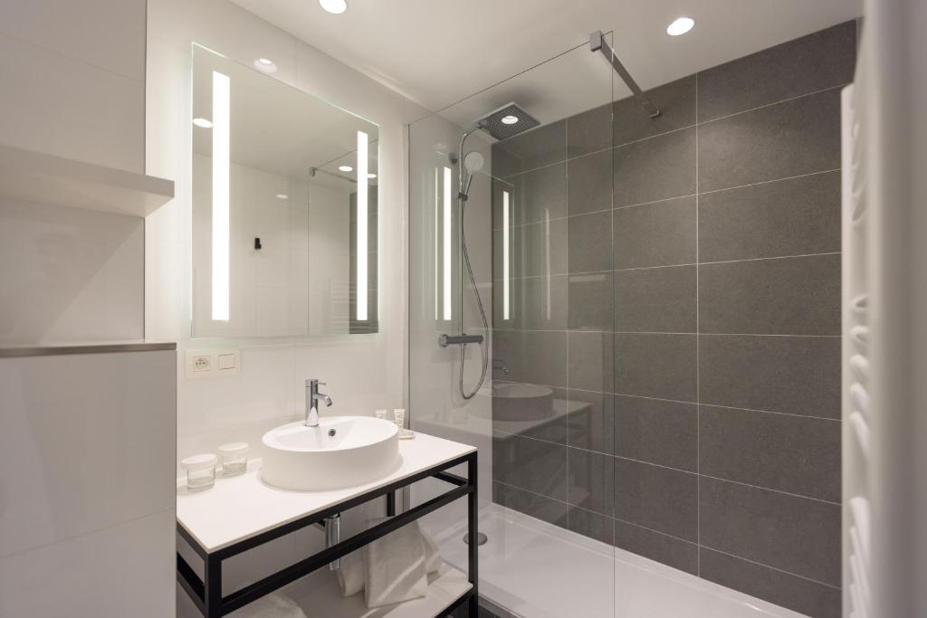 Kupaonica u objektu Hôtel Riva Art & Spa