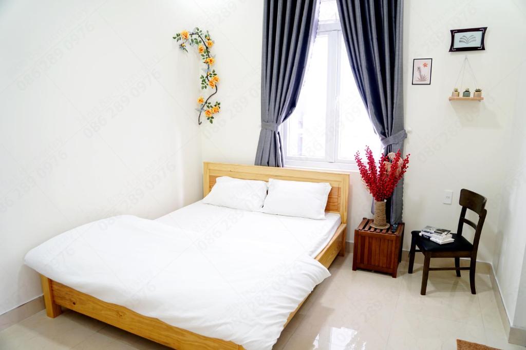 Giường trong phòng chung tại Môn Bạc Home