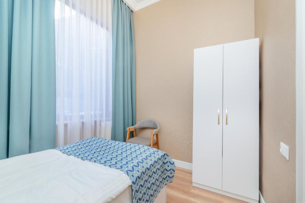 Postel nebo postele na pokoji v ubytování MY HOTEL