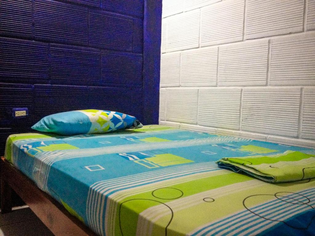Postel nebo postele na pokoji v ubytování Hostel El Gran Azul Olon