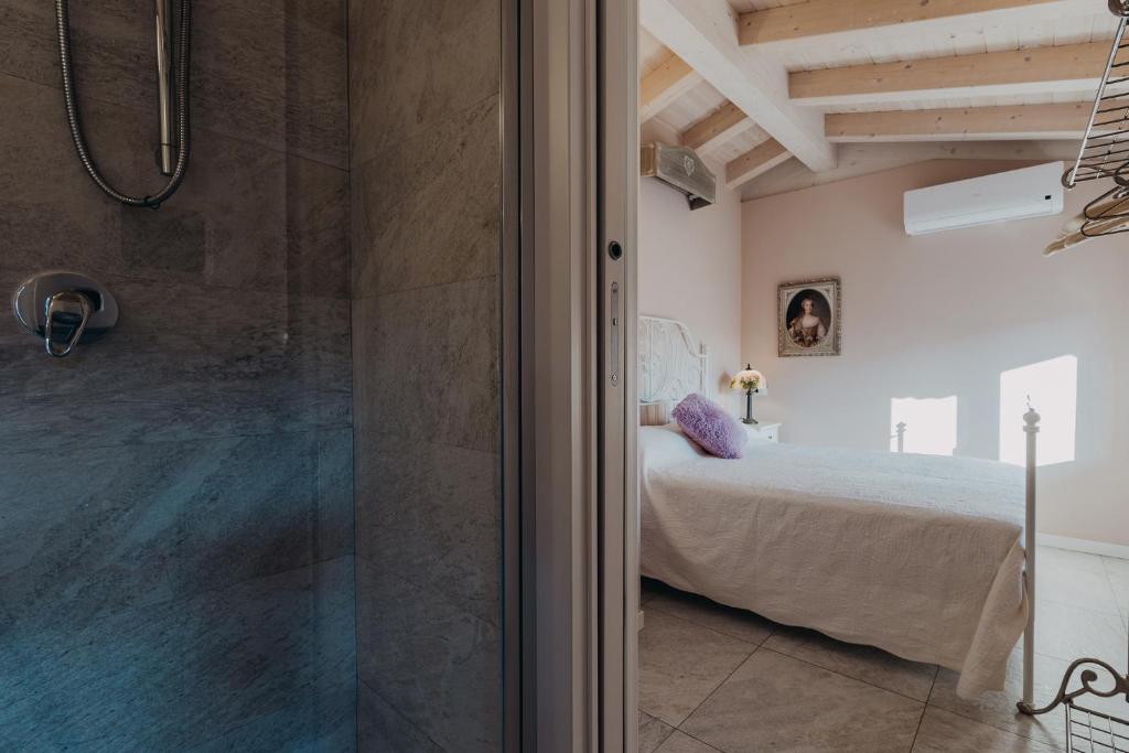 Letto o letti in una camera di Le Due Dame