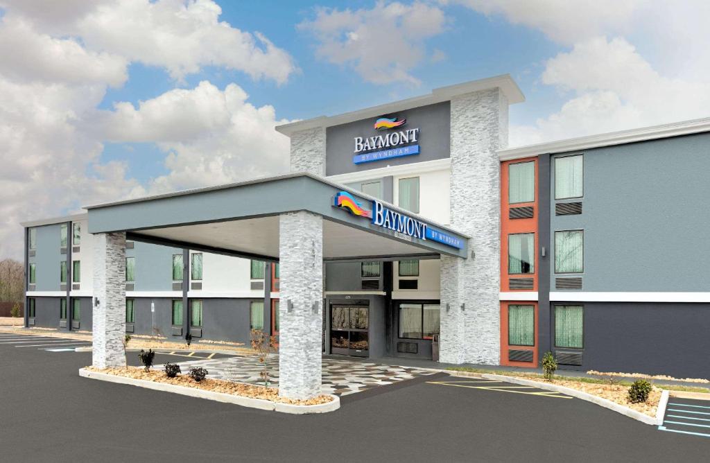 a rendering of the front of a building at Baymont by Wyndham Chattanooga Eastridge in East Ridge