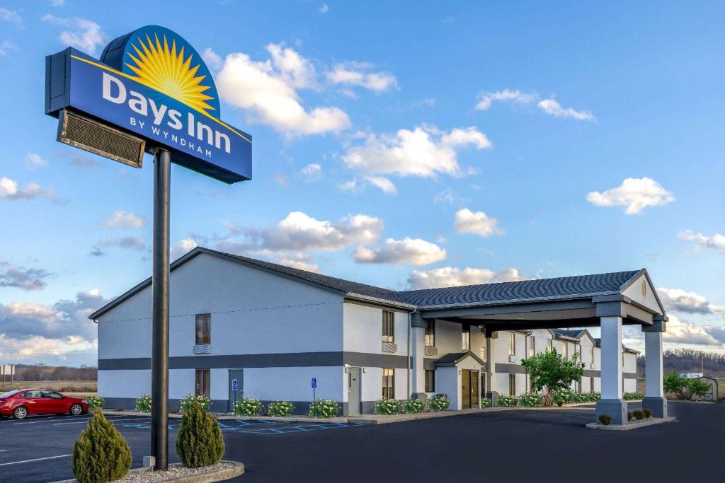 a rendering of a days inn with a sign at Days Inn by Wyndham Grayson in Grayson
