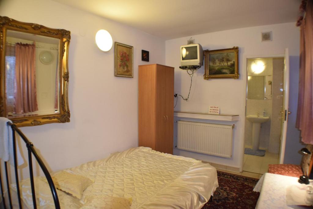 Postel nebo postele na pokoji v ubytování Piaseczno Willa Staropolska
