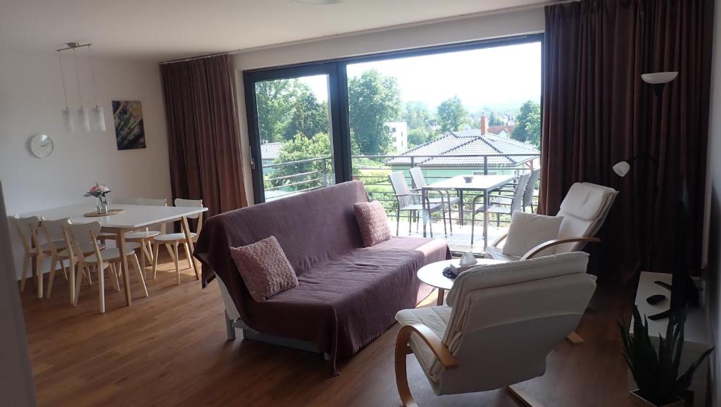 Posezení v ubytování Apartments A + L