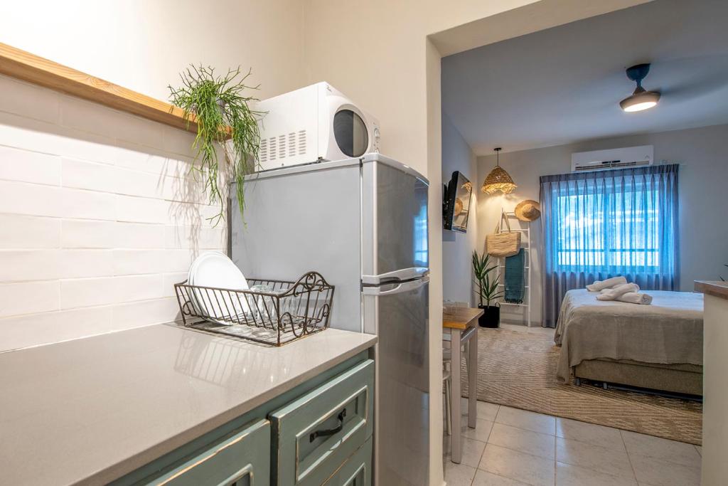 Postel nebo postele na pokoji v ubytování כפר הנופש קיבוץ גדות Kibbutz Gadot Galilean Resort