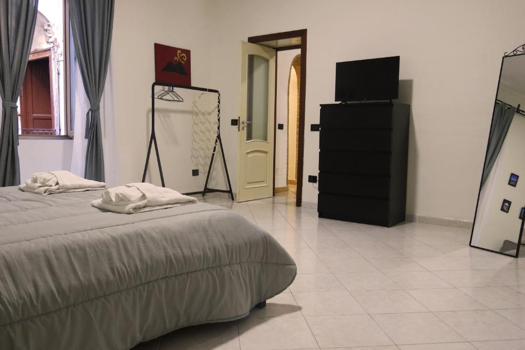 Łóżko lub łóżka w pokoju w obiekcie Maison Agnone
