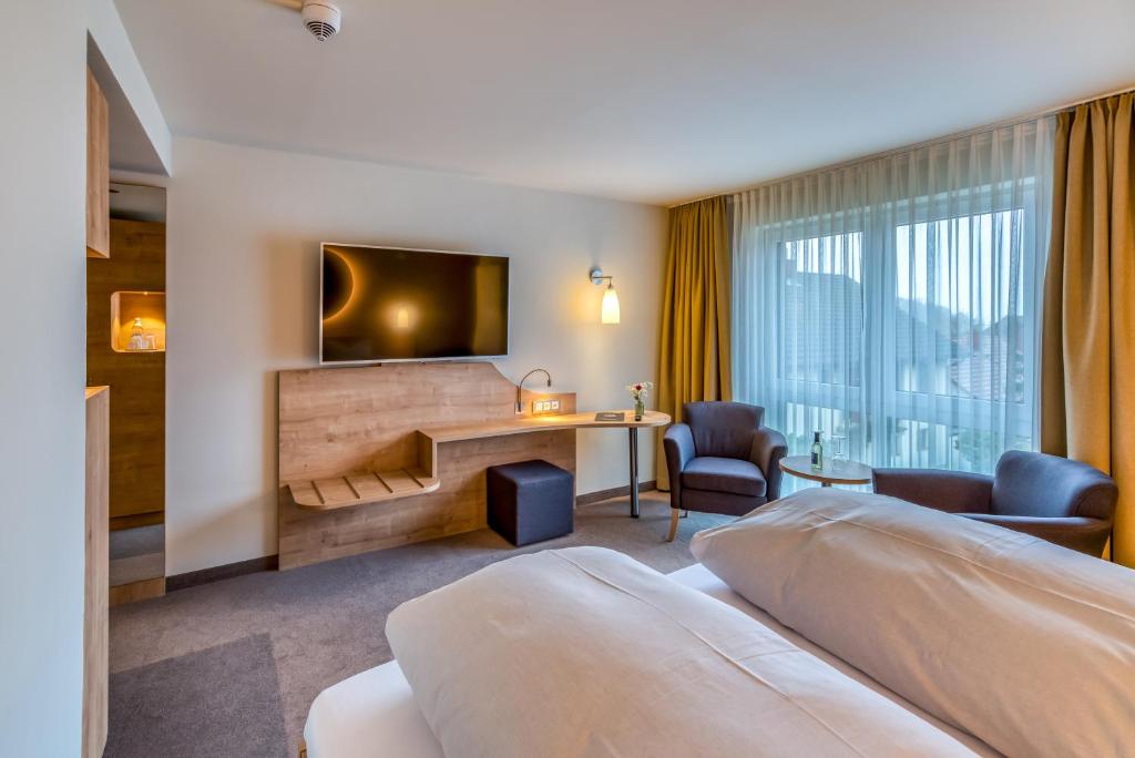 Postel nebo postele na pokoji v ubytování Hotel Beckmann