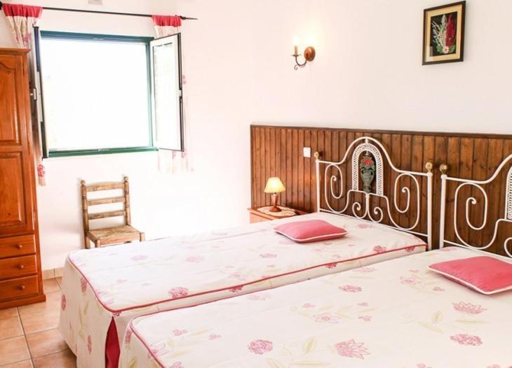 Postel nebo postele na pokoji v ubytování Monte dos Avós