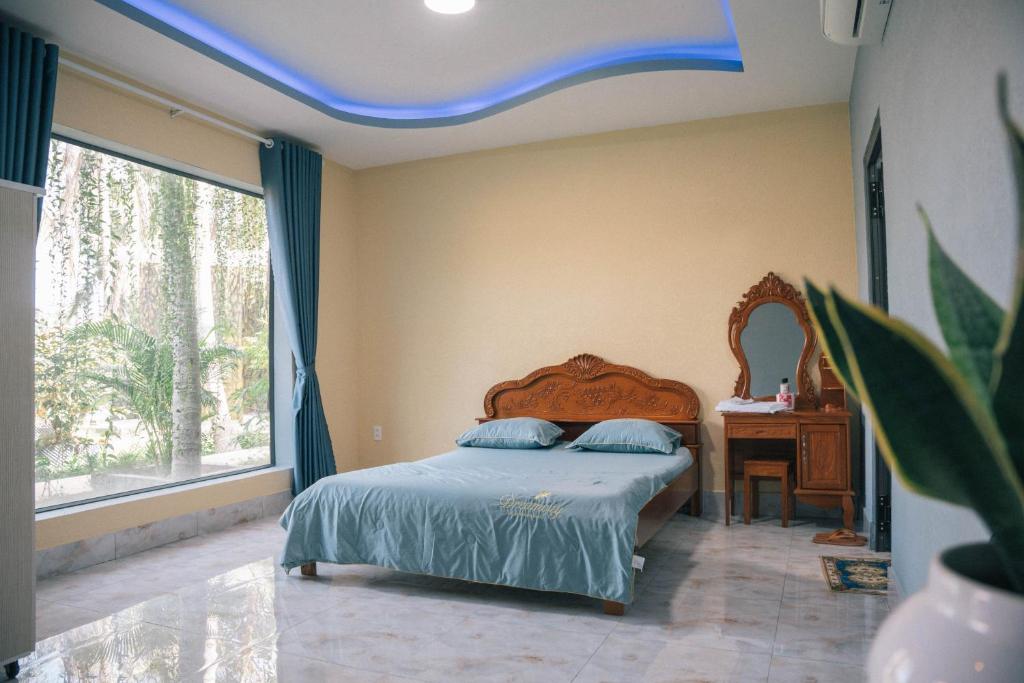 Postel nebo postele na pokoji v ubytování Homestay Bảo Bình