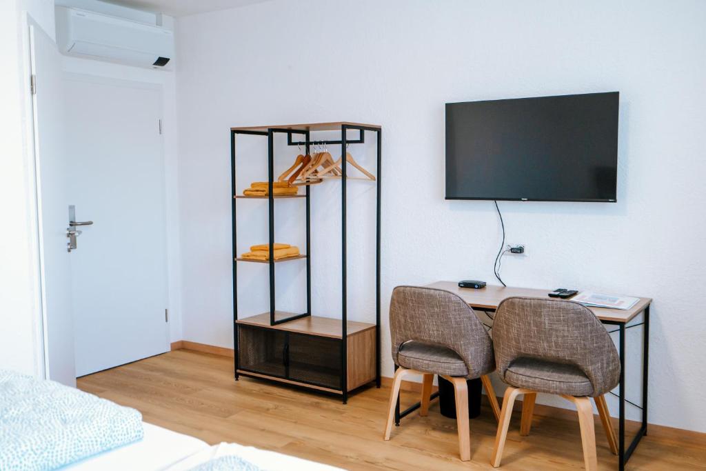 TV a/nebo společenská místnost v ubytování Dill Hotel
