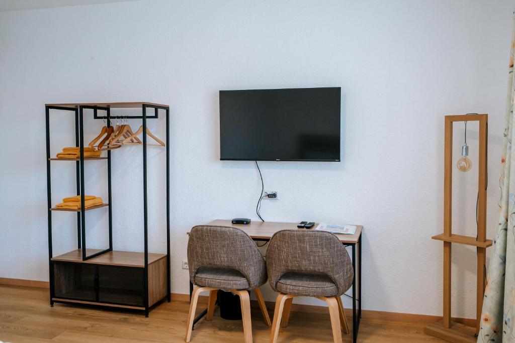 TV a/nebo společenská místnost v ubytování Dill Hotel