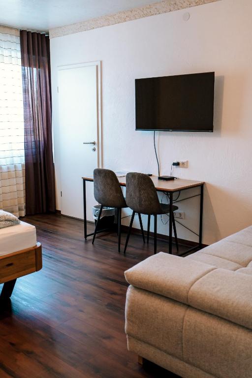 TV a/nebo společenská místnost v ubytování Dill Hotel