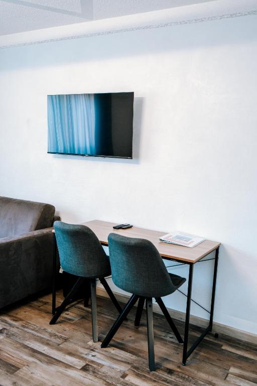 TV a/nebo společenská místnost v ubytování Dill Hotel
