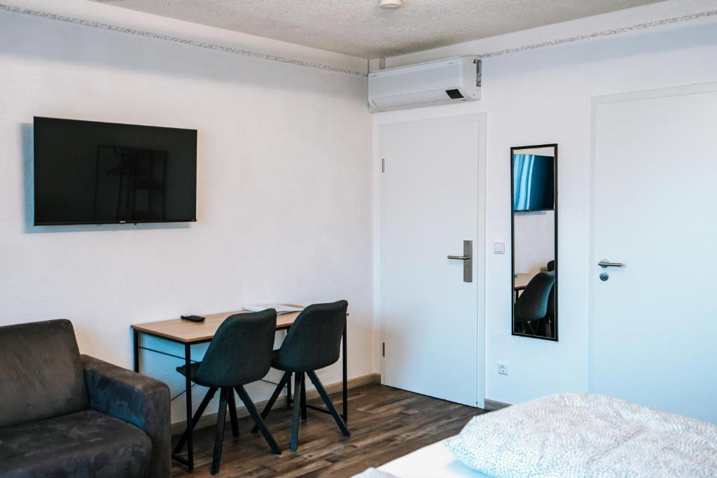 TV a/nebo společenská místnost v ubytování Dill Hotel