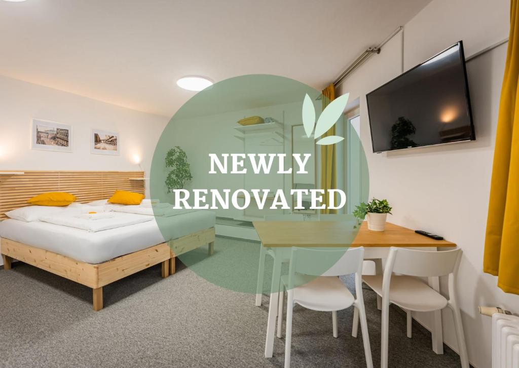 Postel nebo postele na pokoji v ubytování Self-service Hotel Ostaš Praha
