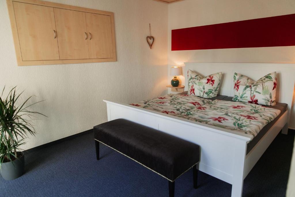 Postel nebo postele na pokoji v ubytování Ferienhaus LORINI