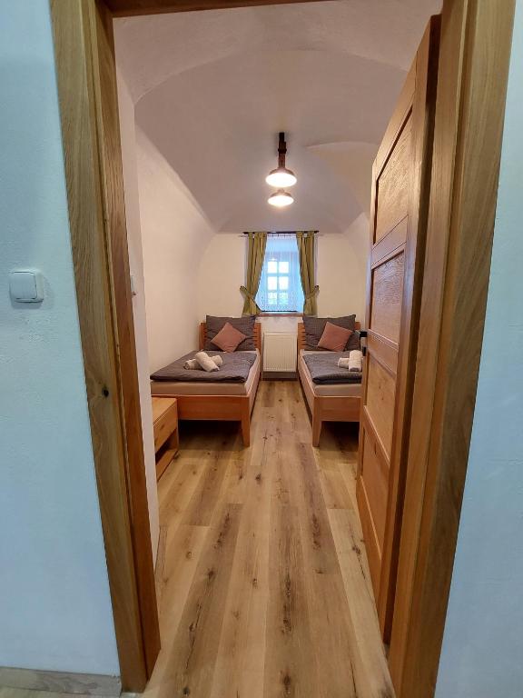 Postel nebo postele na pokoji v ubytování Villa Celnice