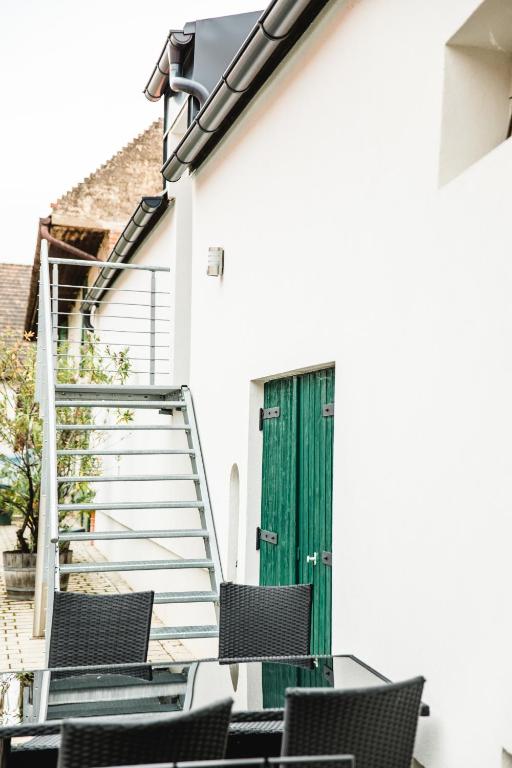 Balkón nebo terasa v ubytování Weingut Guttmann - Apartment Schwalbennester