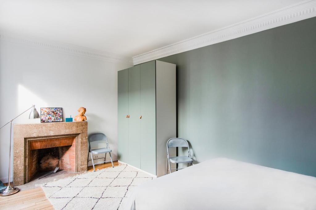 Posteľ alebo postele v izbe v ubytovaní Courcelles Design Duplex