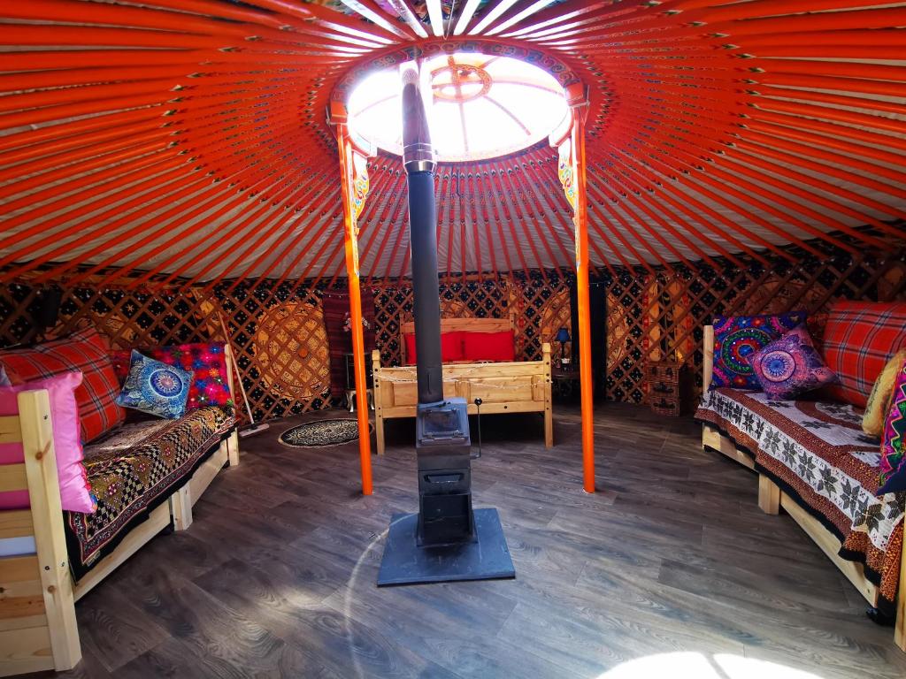 Postel nebo postele na pokoji v ubytování The Yurt