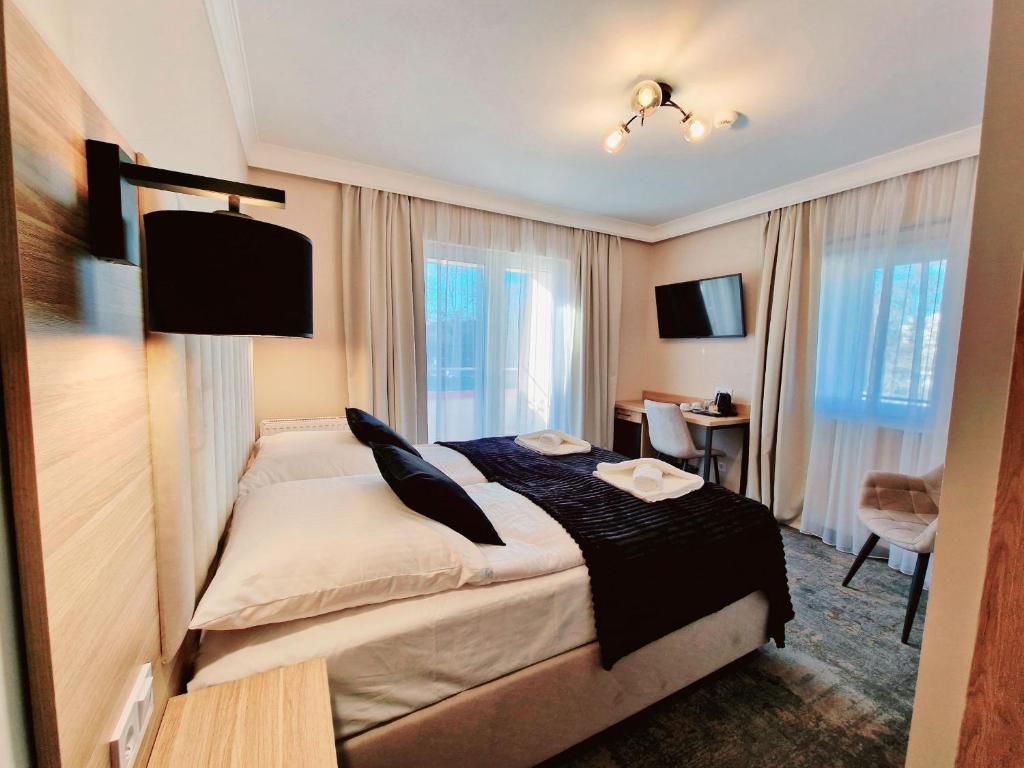 Postel nebo postele na pokoji v ubytování Villa Cristal