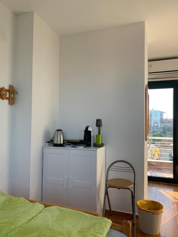 Postel nebo postele na pokoji v ubytování BLUE HOUSE