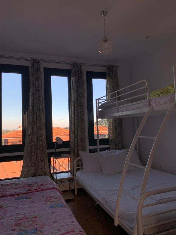 Postel nebo postele na pokoji v ubytování BLUE HOUSE