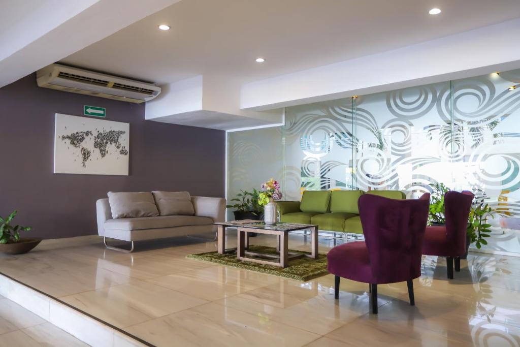 Posezení v ubytování TRYP by Wyndham Chetumal
