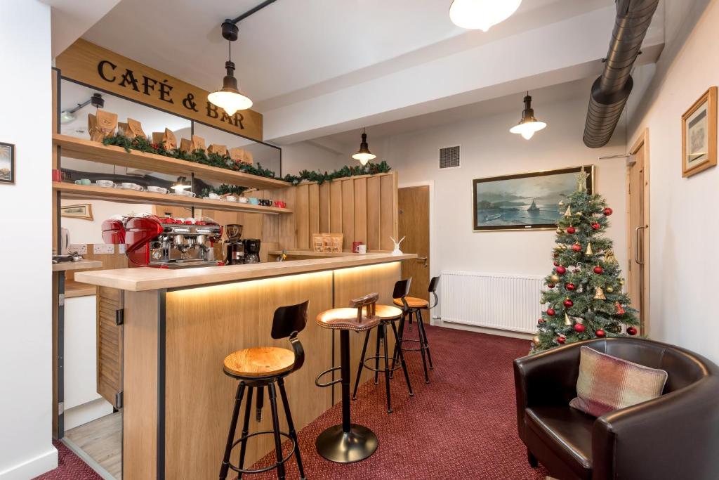 Kuchyň nebo kuchyňský kout v ubytování SMITH PLACE HOTEL