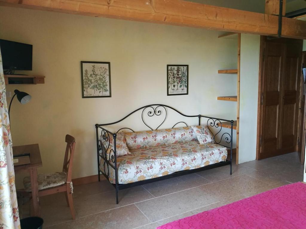 Postel nebo postele na pokoji v ubytování Costa degli Ulivi