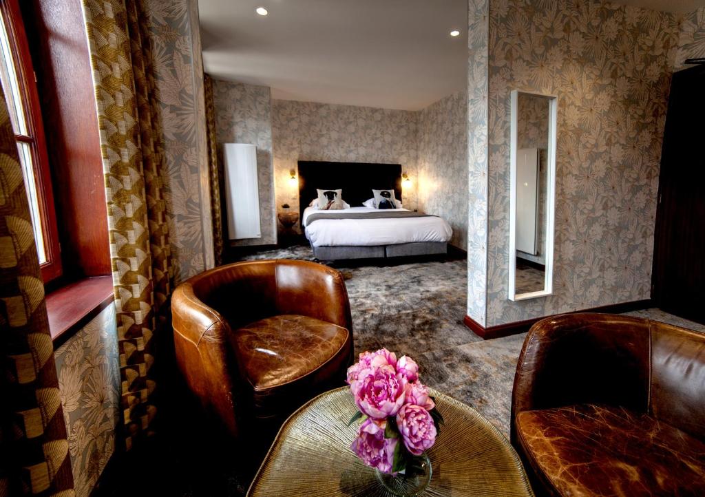 Postel nebo postele na pokoji v ubytování Logis Hôtel & Restaurant - Les Hauts de Montreuil