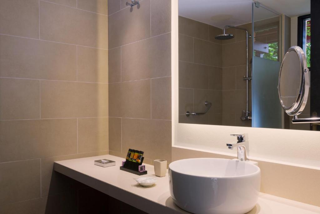 Koupelna v ubytování Kalypso Hotel