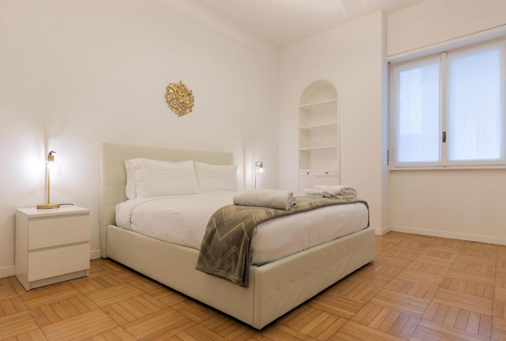 Кровать или кровати в номере Milan Retreats