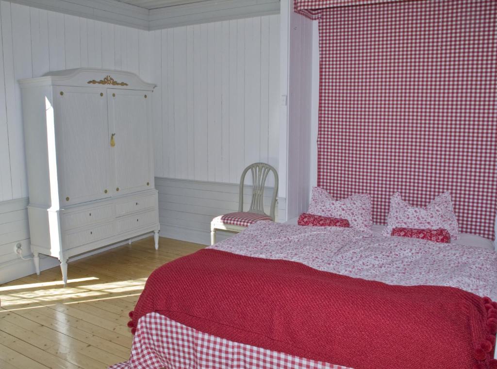Postel nebo postele na pokoji v ubytování Hem till Gården boutique hotel