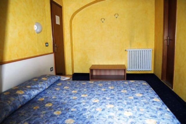 Postel nebo postele na pokoji v ubytování Hotel Beata Giovannina