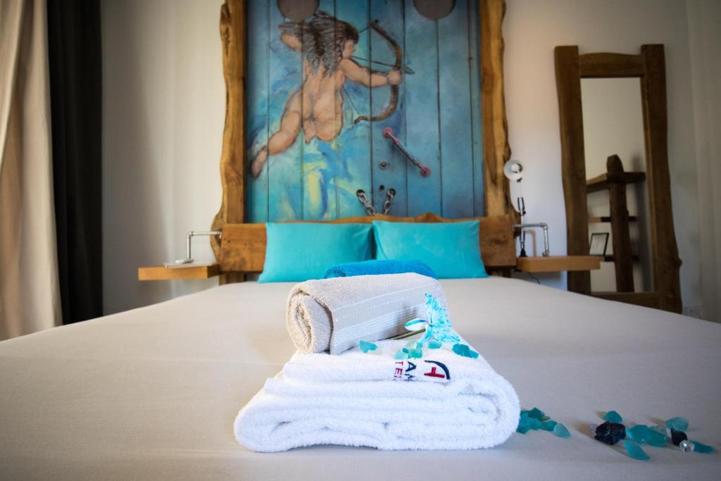 Postel nebo postele na pokoji v ubytování Modern & Recycled Guest House