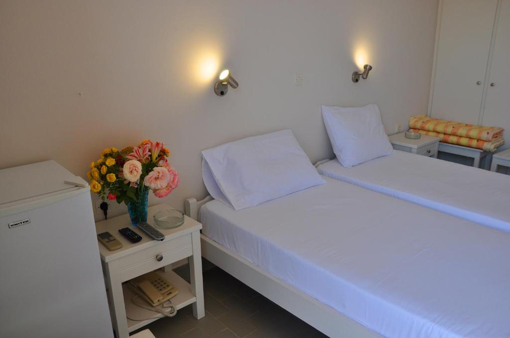 Postel nebo postele na pokoji v ubytování Nora Hotel