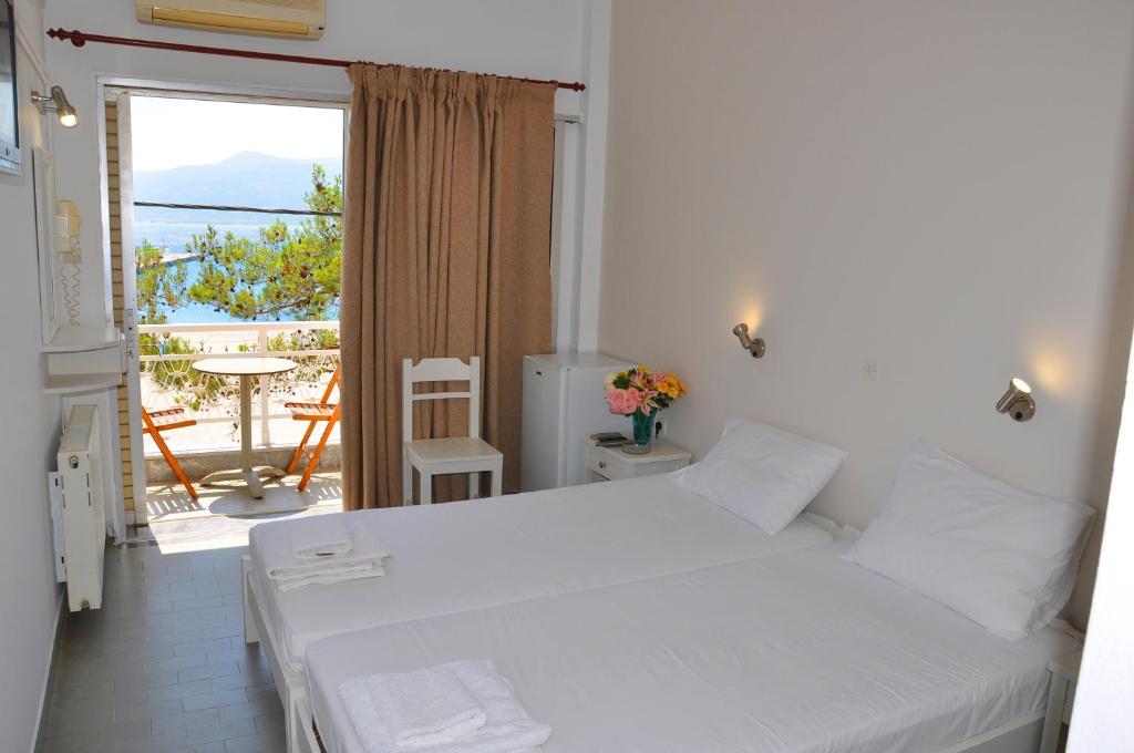 Postel nebo postele na pokoji v ubytování Nora Hotel