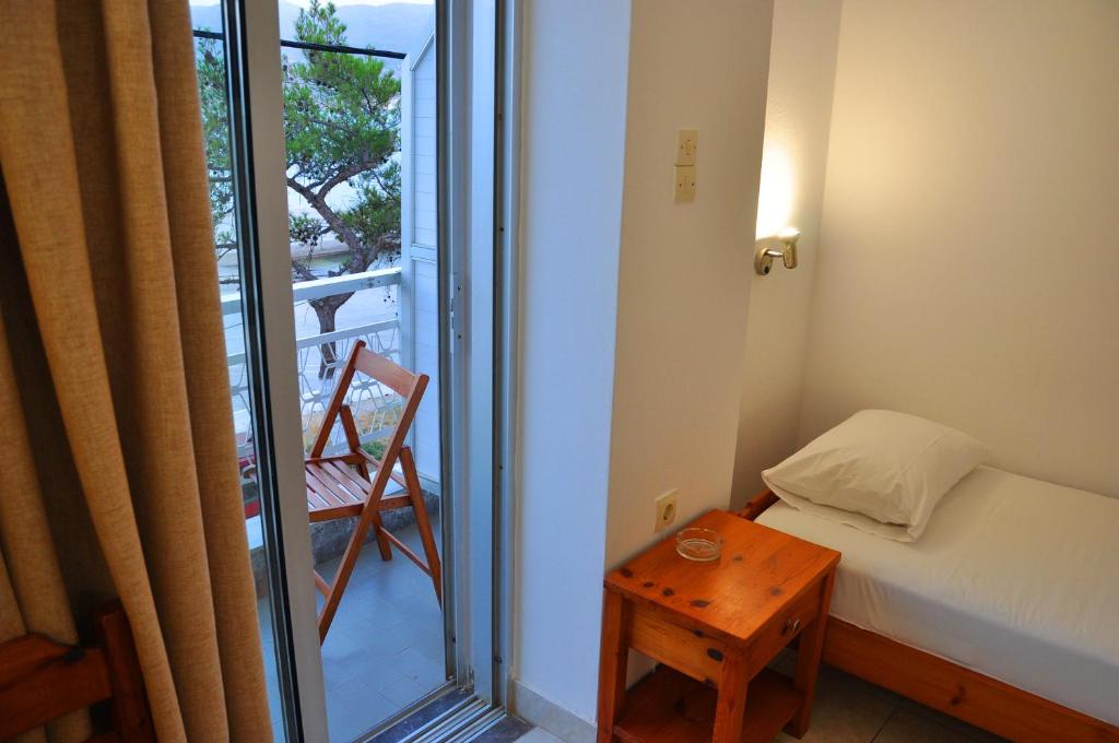 Postel nebo postele na pokoji v ubytování Nora Hotel