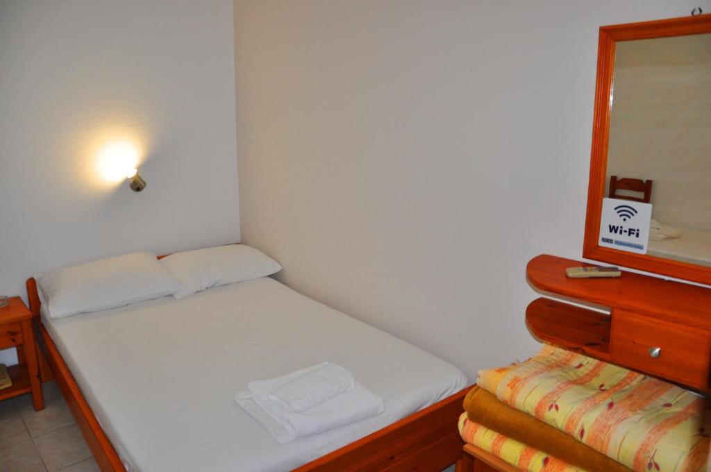 Postel nebo postele na pokoji v ubytování Nora Hotel