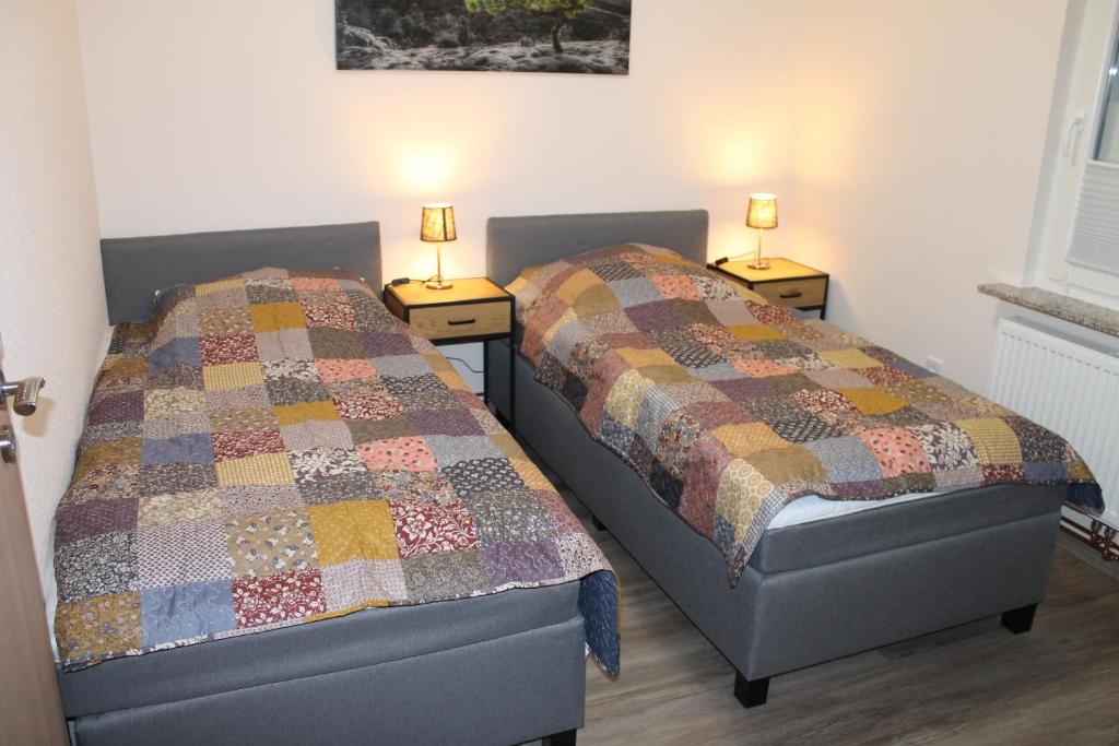 Postel nebo postele na pokoji v ubytování Ferienwohnung Krümel