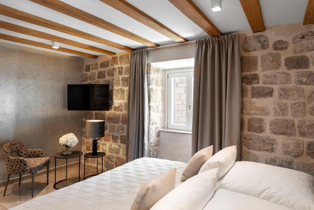 TV in/ali zabaviščno središče v nastanitvi Sea Rocks Residence