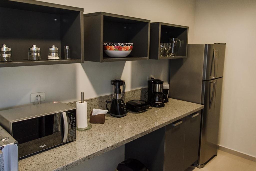 Kuchyň nebo kuchyňský kout v ubytování Departamento moderno en Asunción Villa Morra