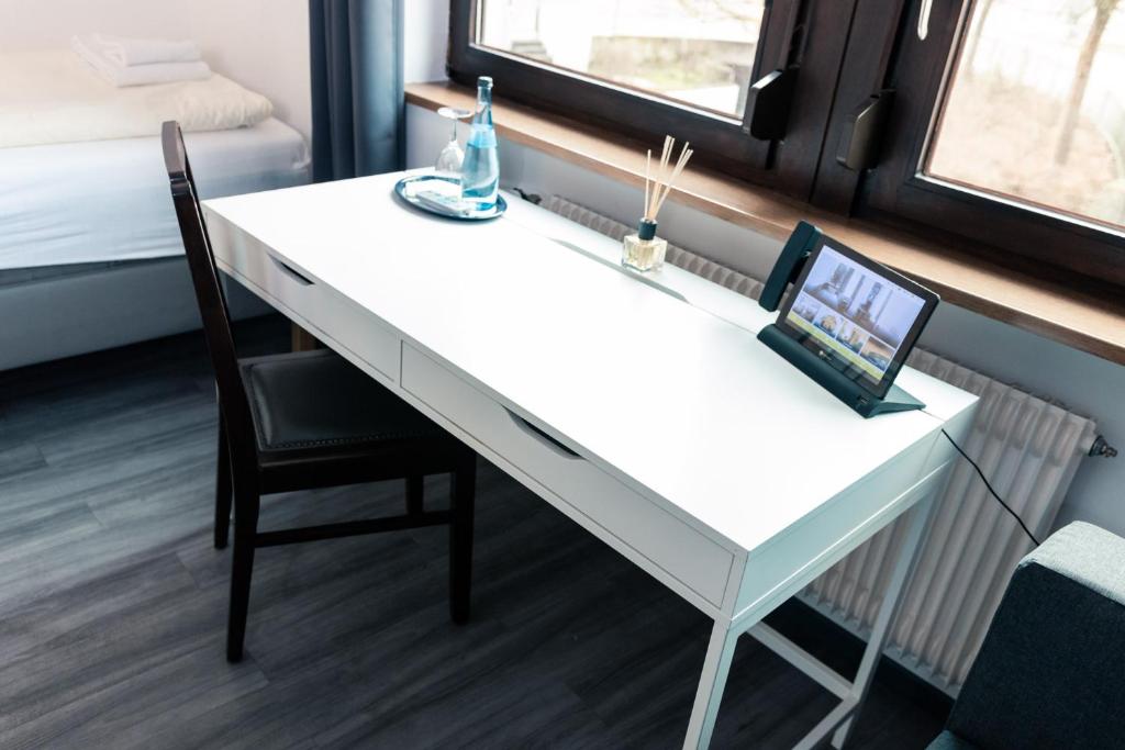 Postel nebo postele na pokoji v ubytování Hotel Scharfes Eck