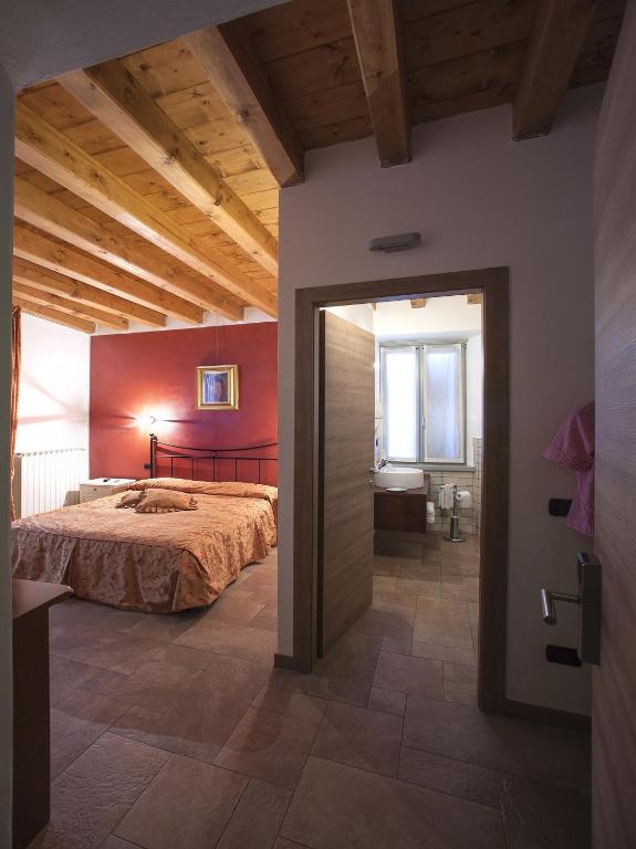 Postel nebo postele na pokoji v ubytování B&B Sant'Antonio De Foris