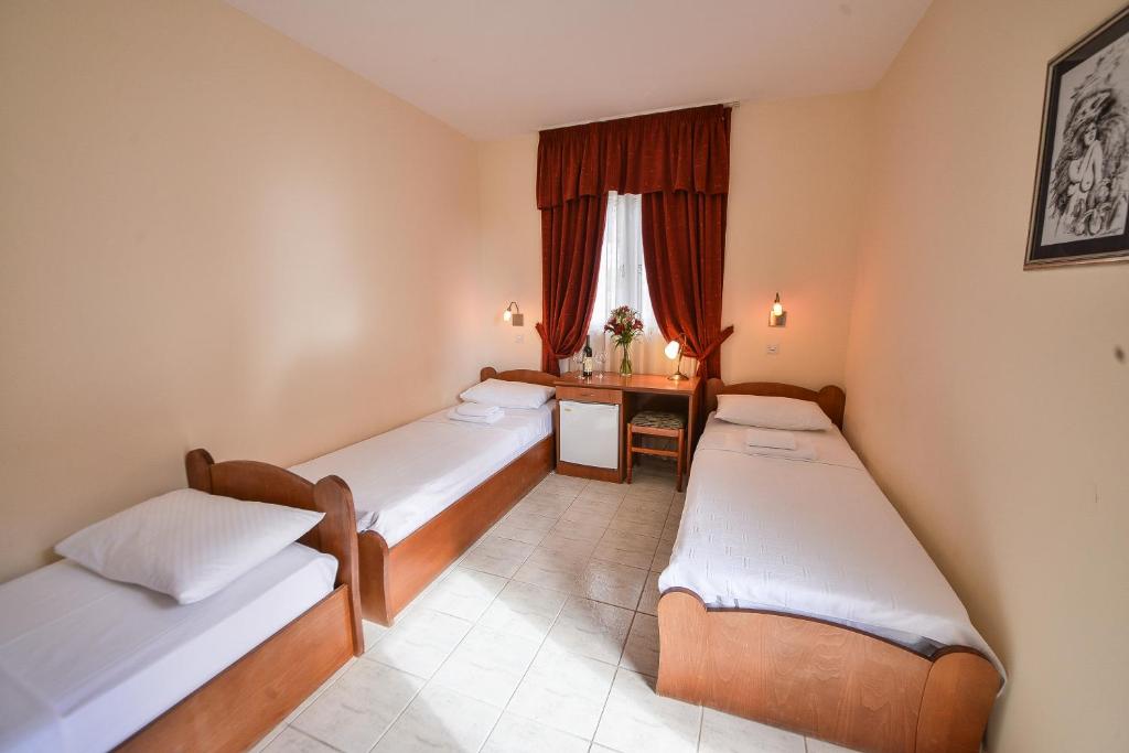 Ένα ή περισσότερα κρεβάτια σε δωμάτιο στο Hotel Podostrog