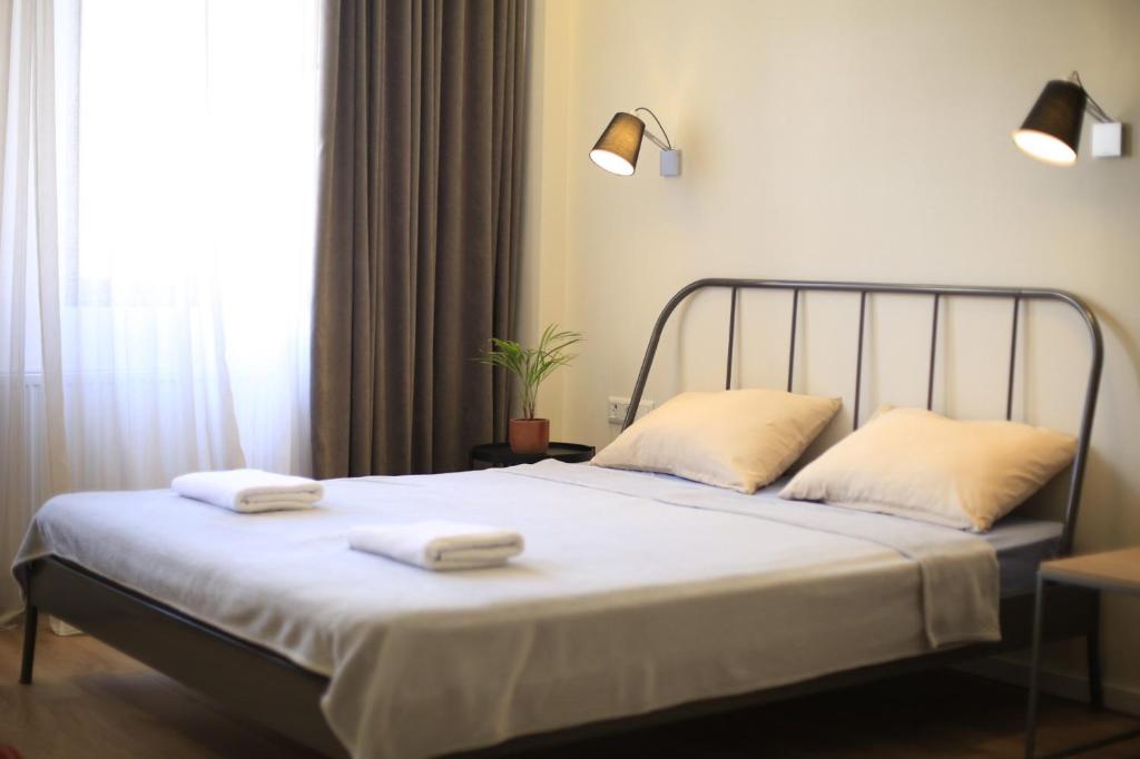 Giường trong phòng chung tại Gudauri Redco