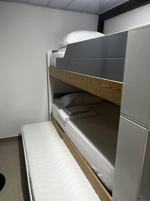 Postel nebo postele na pokoji v ubytování Cabaña confortable y familiar
