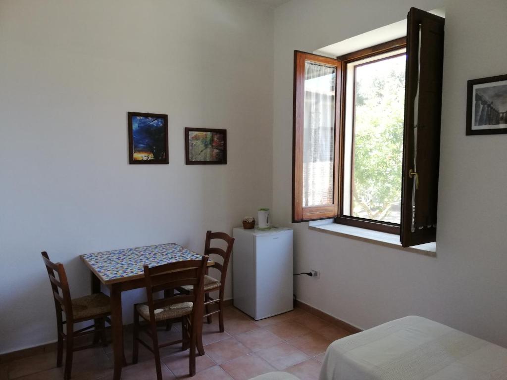 A bed or beds in a room at Casa del Geco
